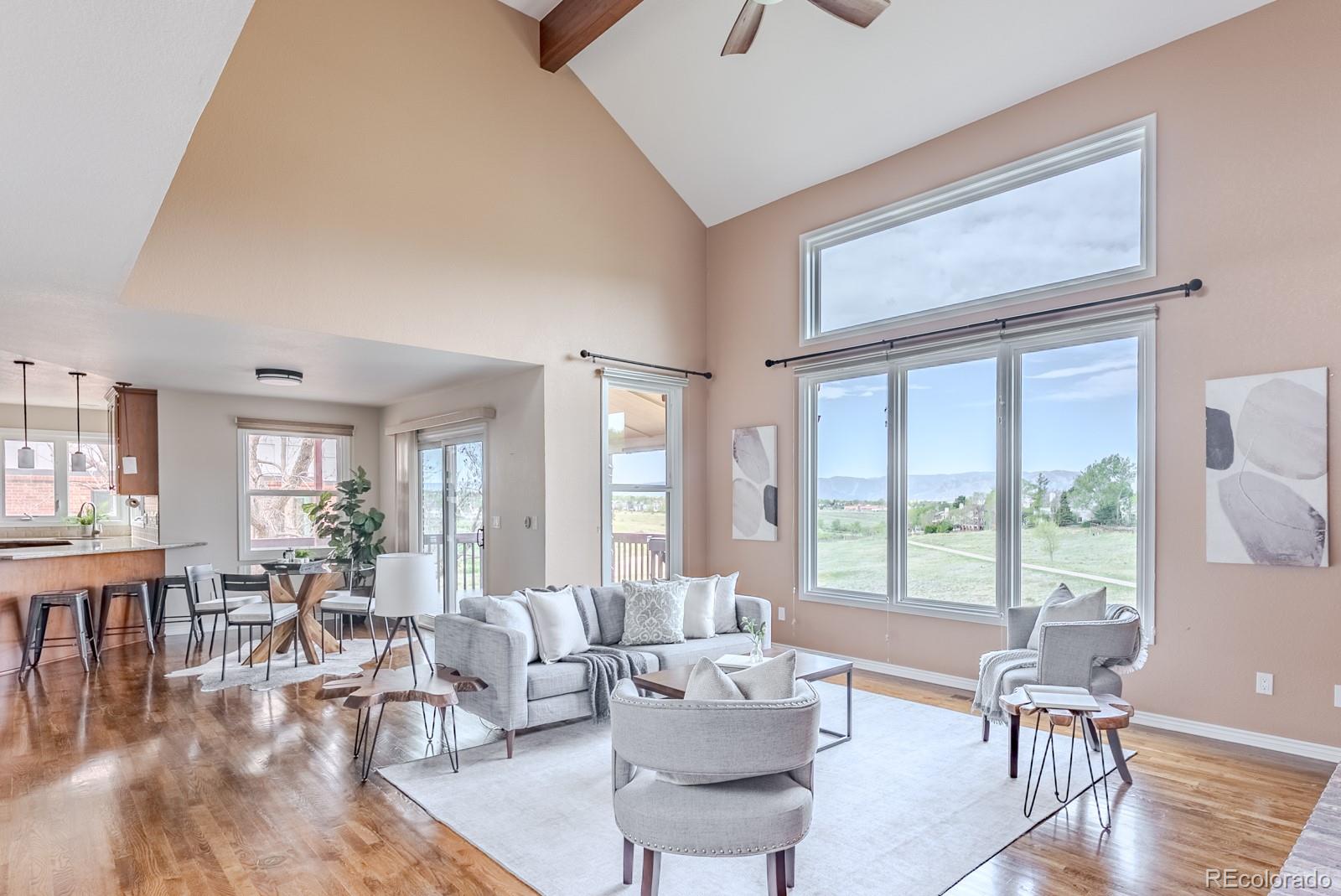 1914 Terrace Drive Highlands Ranch, CO 80126 - Photo 6 of 47 a living room with furniture and a large window