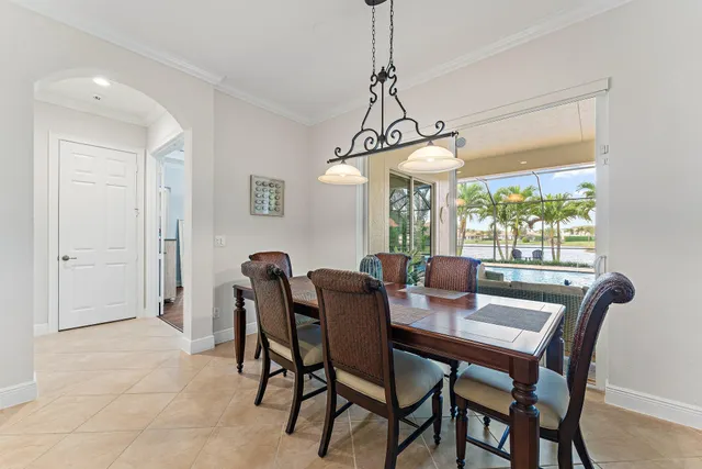 a view of a lake with houses in the back