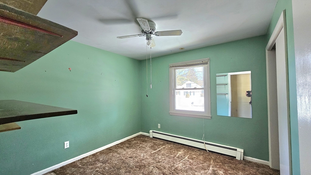 59 North Hatfield Road Hatfield, MA 01038 - Photo 11 of 22 a view of a room with windows and ceiling fan