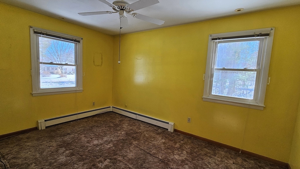 59 North Hatfield Road Hatfield, MA 01038 - Photo 12 of 22 a view of a room with a window and a ceiling fan