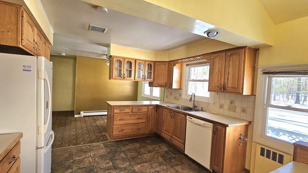 59 North Hatfield Road Hatfield, MA 01038 - Photo 3 of 22 a kitchen with stainless steel appliances granite countertop a sink and a refrigerator