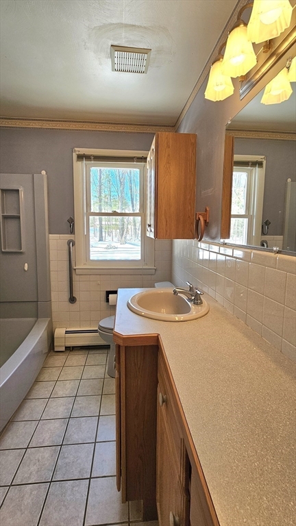 59 North Hatfield Road Hatfield, MA 01038 - Photo 7 of 22 a kitchen with a sink and a stove top oven