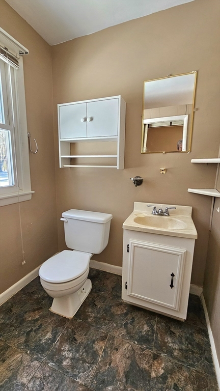 59 North Hatfield Road Hatfield, MA 01038 - Photo 10 of 22 a bathroom with a toilet sink and mirror