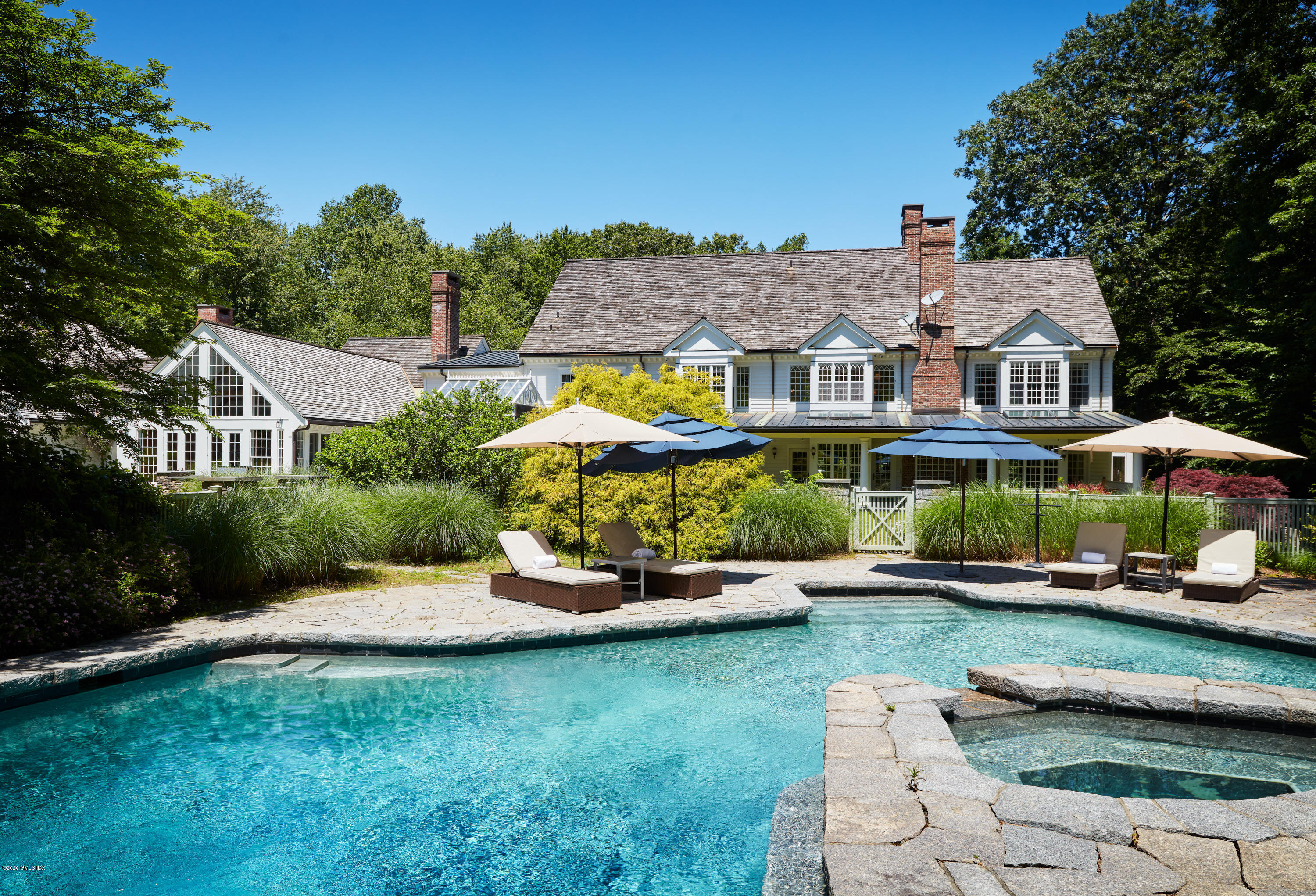 74 Upper Cross Road Greenwich, CT 06831 - Photo 18 of 20 an aerial view of a house with a garden view