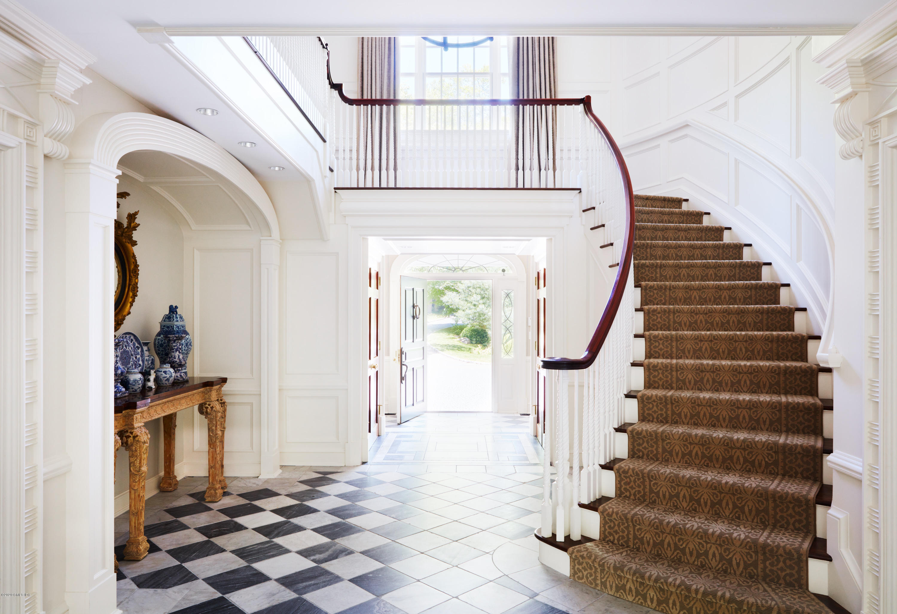 74 Upper Cross Road Greenwich, CT 06831 - Photo 3 of 20 a view of entryway with wooden floor and stairs