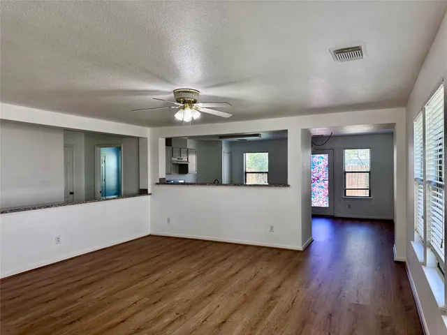 a bathroom with a toilet sink and a mirror