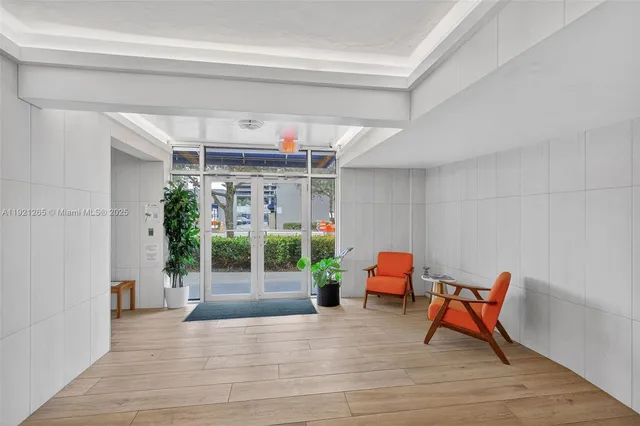 a bedroom with a bed and a mirror