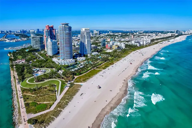 a view of a field with an trees