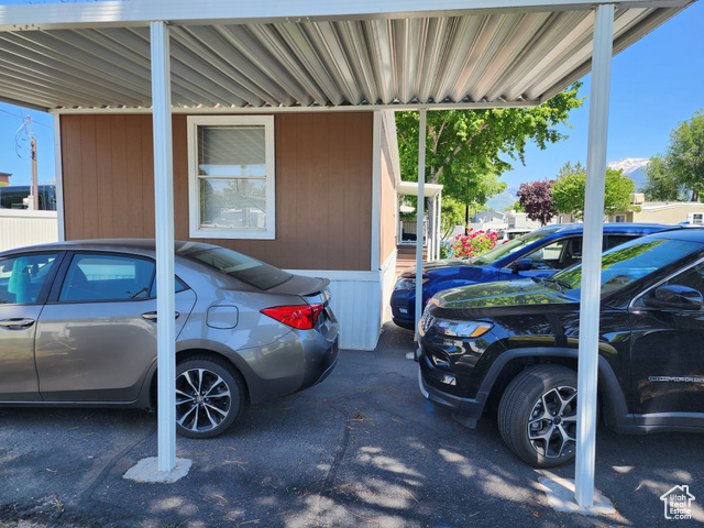49 Apollo Way Sandy, UT 84070 - Photo 1 of 1 View of uncovered parking lot