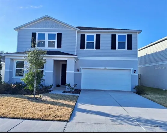 a front view of house with yard