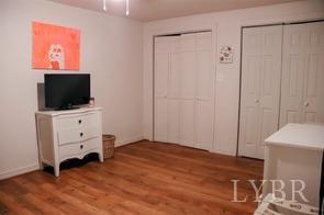 76 Churchview Estate Farmville, VA 23901 - Photo 12 of 20 a room with a chair and flat screen tv