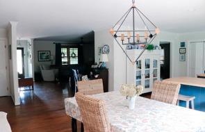 76 Churchview Estate Farmville, VA 23901 - Photo 5 of 20 a view of a livingroom with furniture wooden floor and a dining room