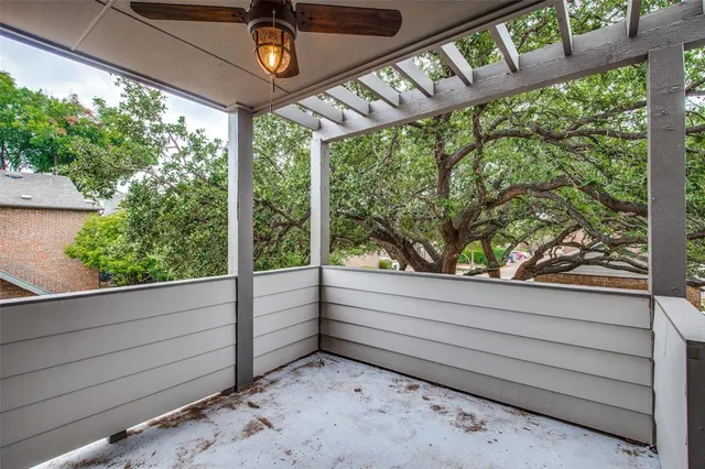 a view of a porch with wooden floor and outdoor space