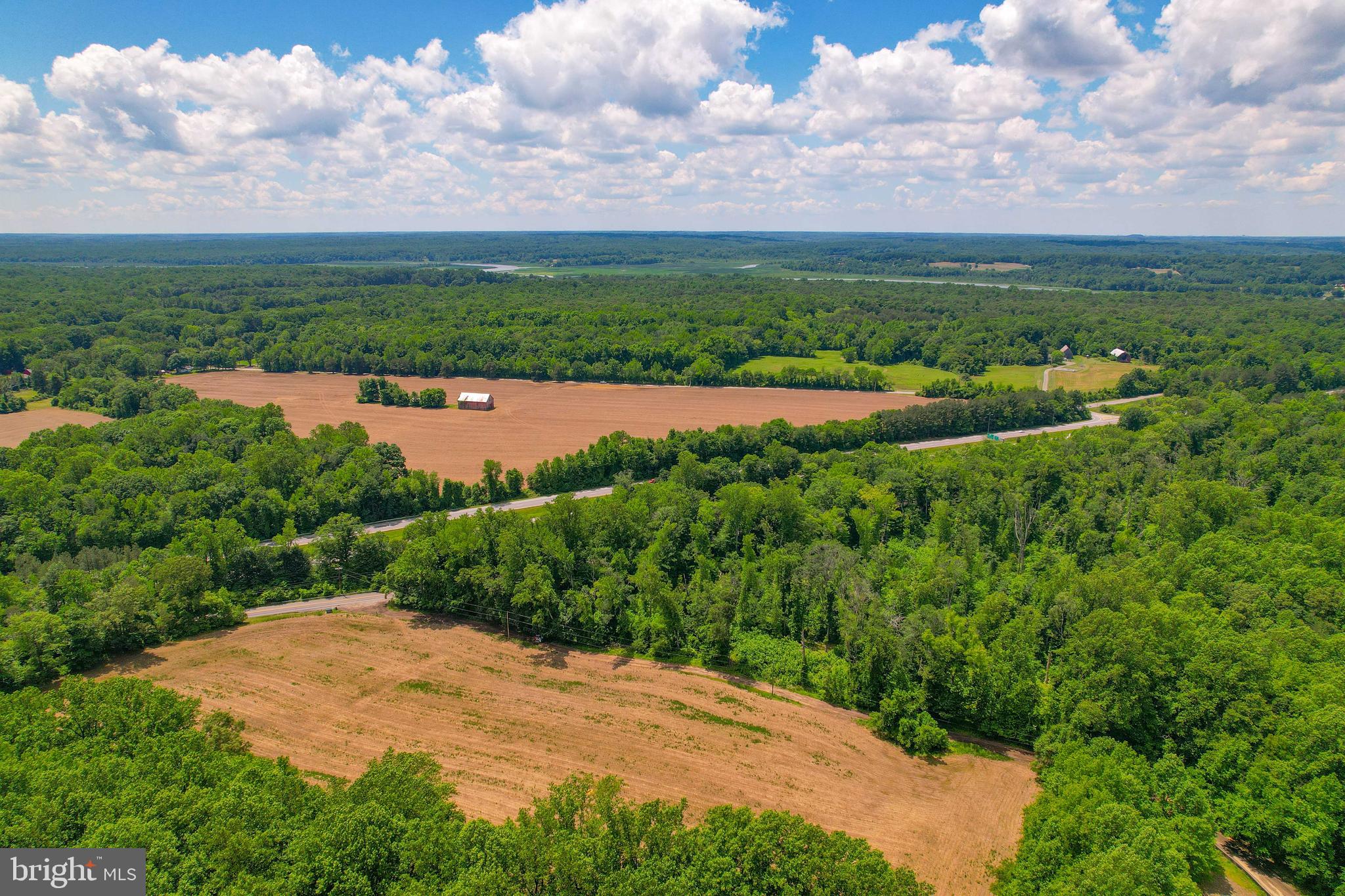 5709 Plummer Lane Lothian, MD 20711 - Photo 3 of 15 an aerial view of a houses with outdoor space and trees all around