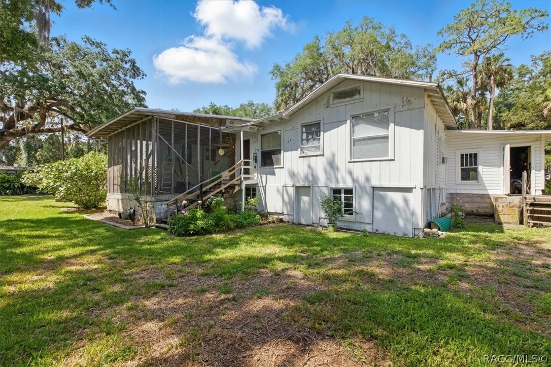 6 62nd Street Yankeetown, FL 34498 - Photo 6 of 55 a front view of house with yard and green space
