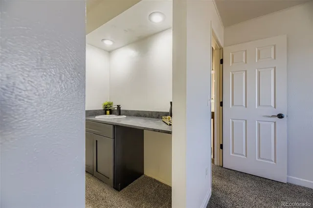 a view of bathroom with dual sinks