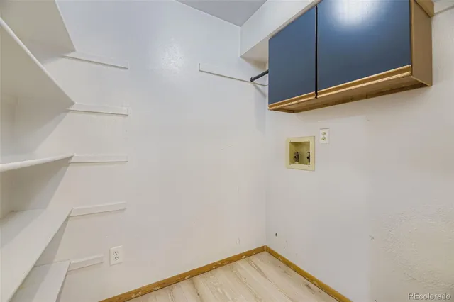 a view of a small space with racks on the wall