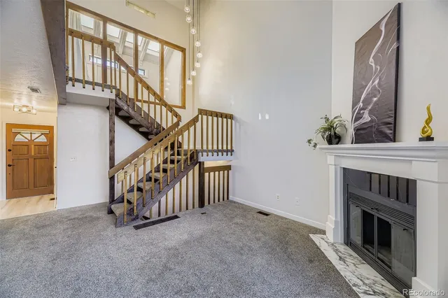 a view of an entryway with a fireplace