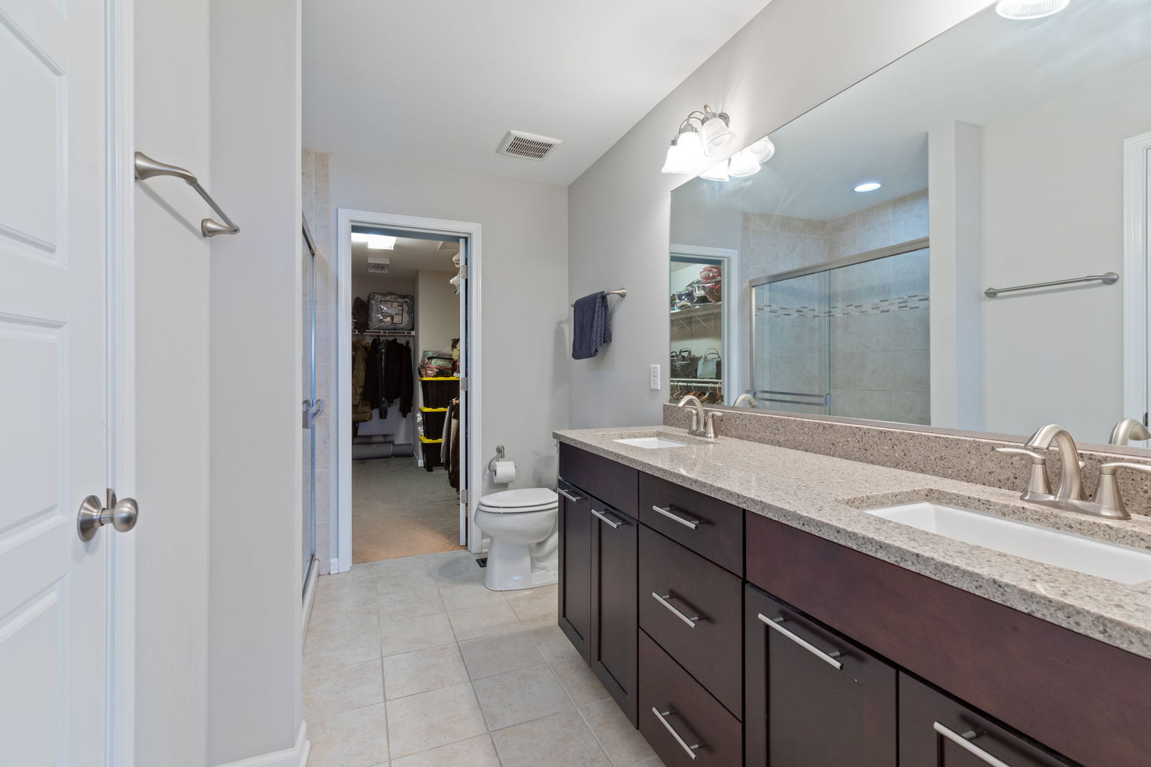 993 Times Square Drive Aurora, IL 60504 - Photo 13 of 26 a spacious bathroom with a granite countertop sink a mirror and a