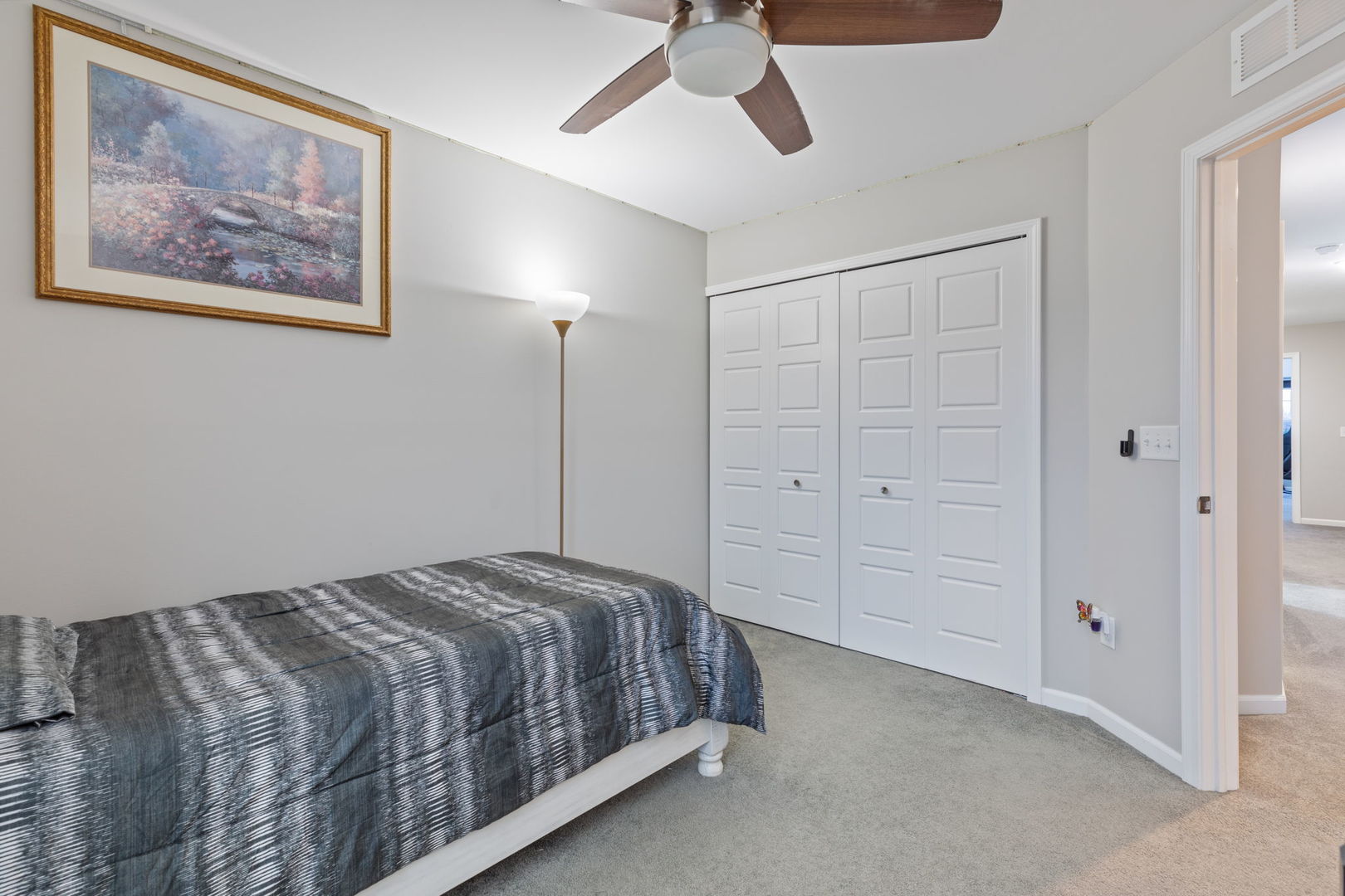 993 Times Square Drive Aurora, IL 60504 - Photo 16 of 26 a bedroom with a bed and painting on the wall