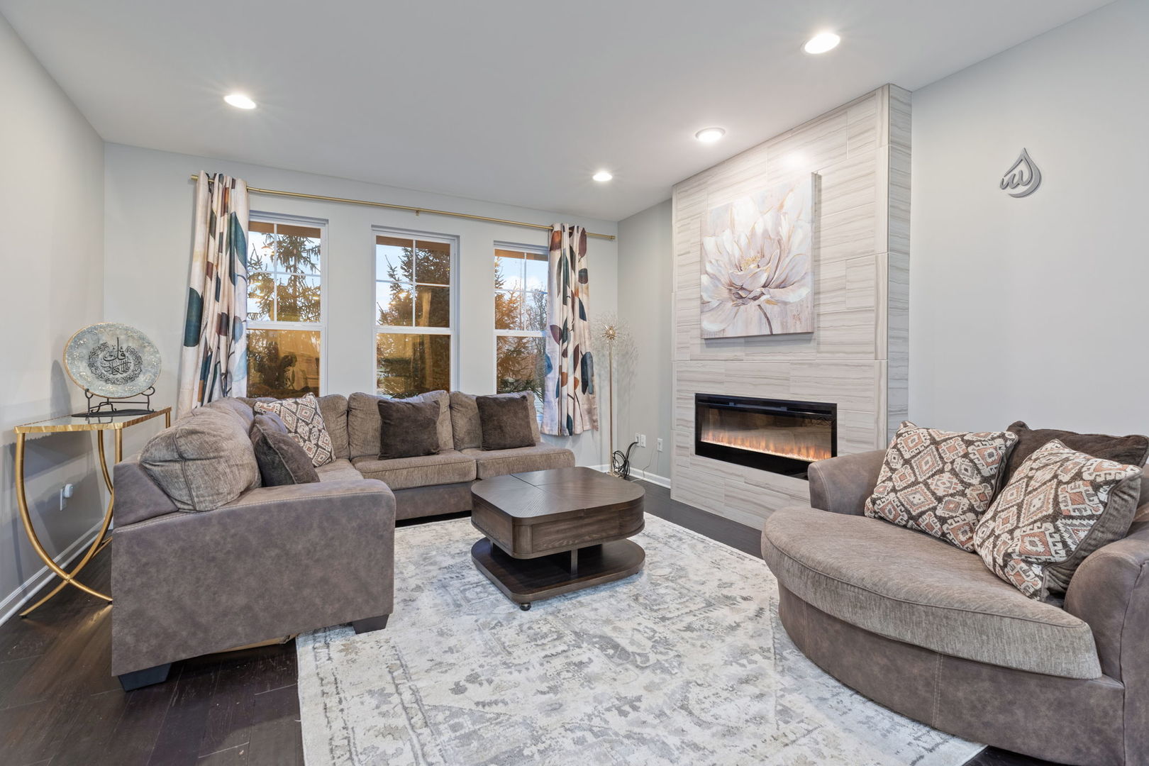 993 Times Square Drive Aurora, IL 60504 - Photo 6 of 26 a living room with furniture and a fireplace