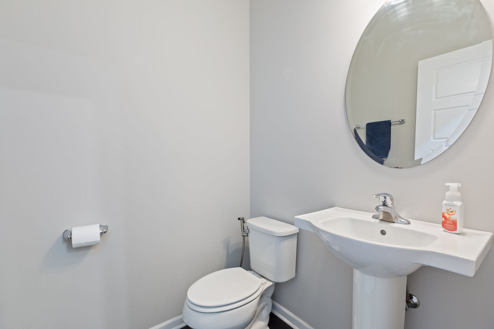 993 Times Square Drive Aurora, IL 60504 - Photo 9 of 26 a bathroom with a toilet a sink and mirror