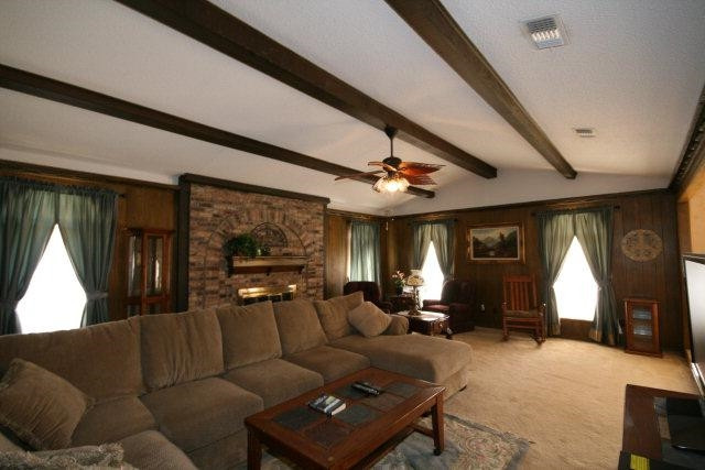 3802 70th Street Lubbock, TX 79413 - Photo 3 of 10 a living room with furniture and a large window