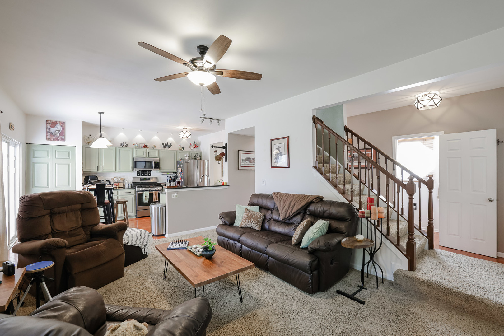 7 Michael Court Lake In The Hills, IL 60156 - Photo 14 of 37 a living room with furniture and a ceiling fan