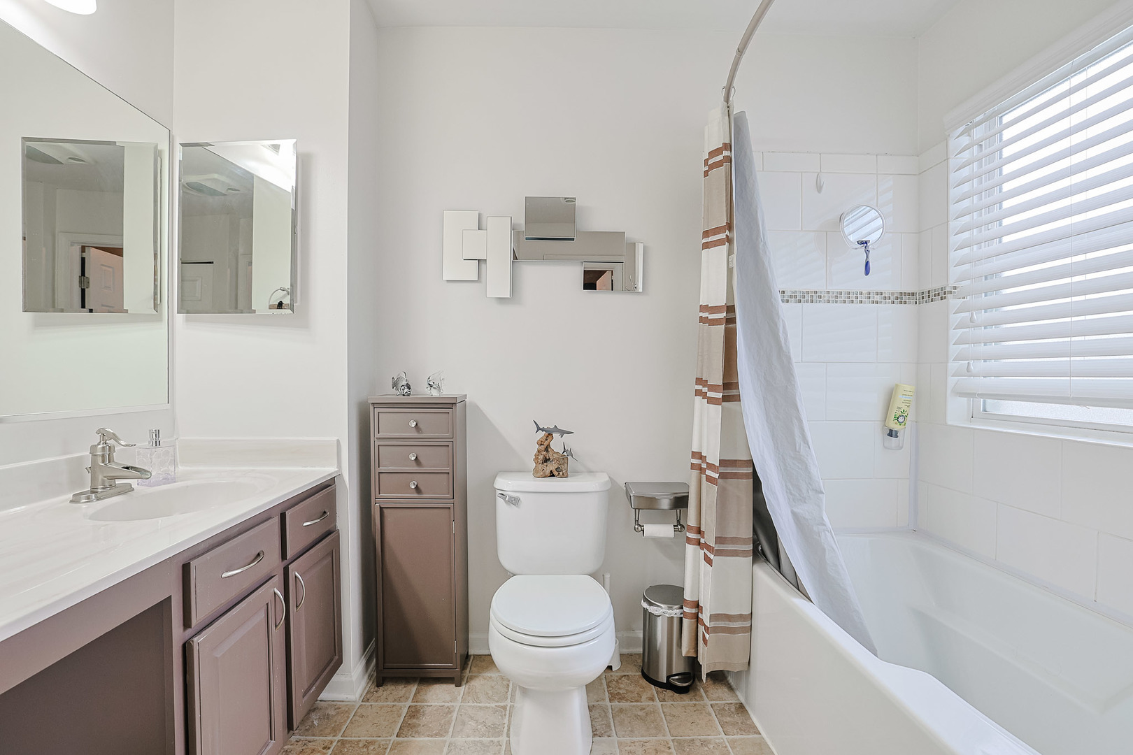 7 Michael Court Lake In The Hills, IL 60156 - Photo 17 of 37 a bathroom with a sink a toilet and a bathtub