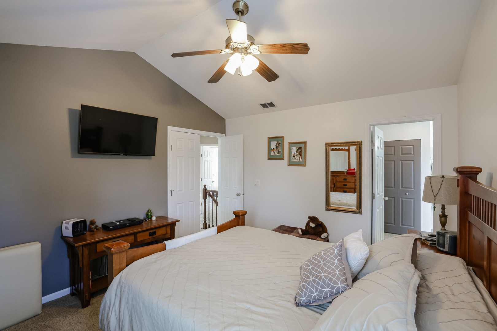 7 Michael Court Lake In The Hills, IL 60156 - Photo 18 of 37 a bedroom with a bed and a flat screen tv