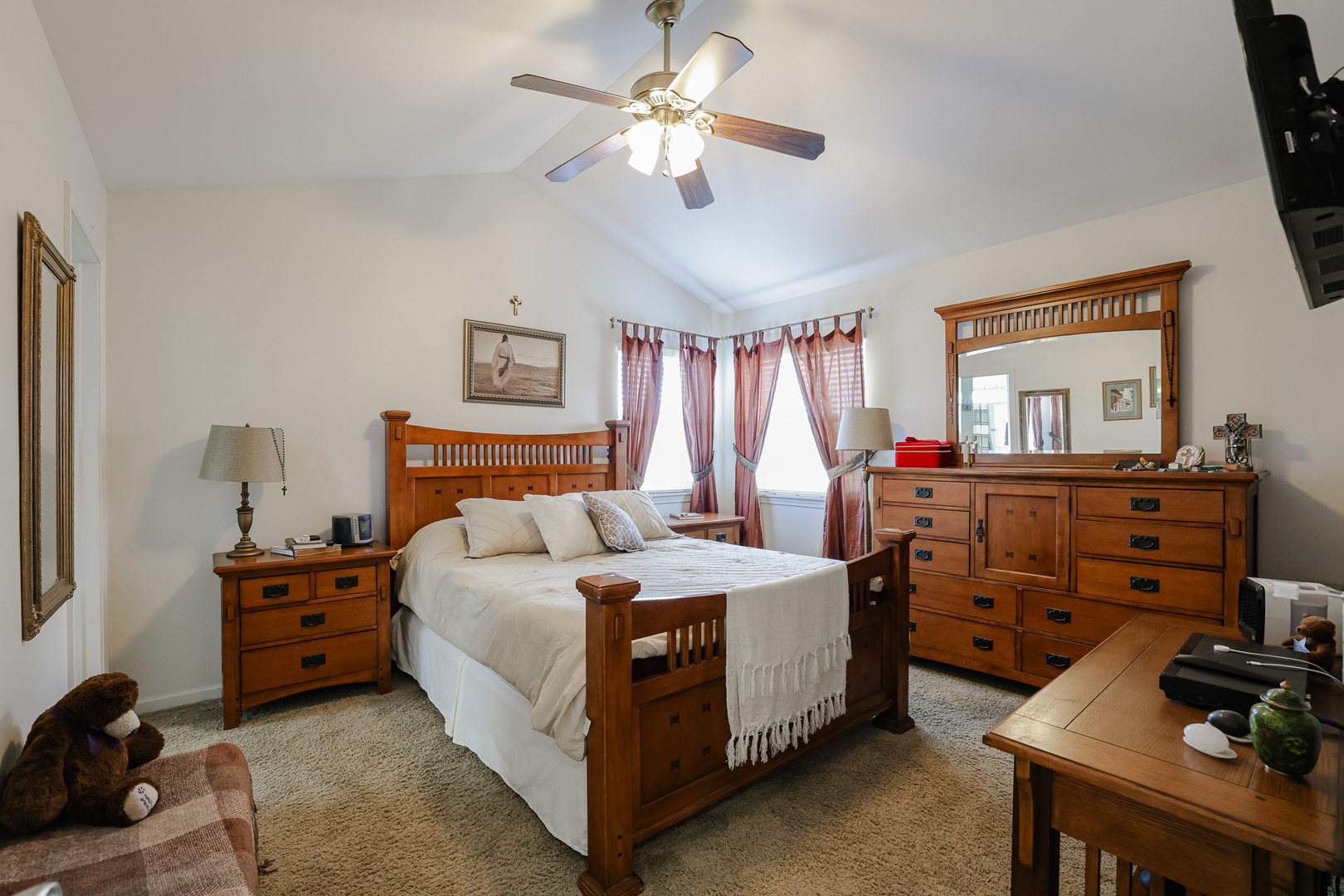 7 Michael Court Lake In The Hills, IL 60156 - Photo 19 of 37 a bedroom with a bed and a chandelier