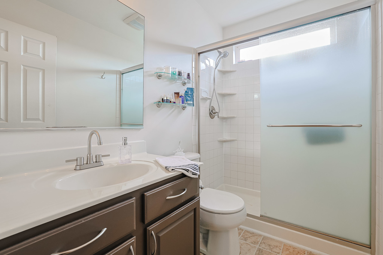 7 Michael Court Lake In The Hills, IL 60156 - Photo 22 of 37 a bathroom with a sink a toilet and shower