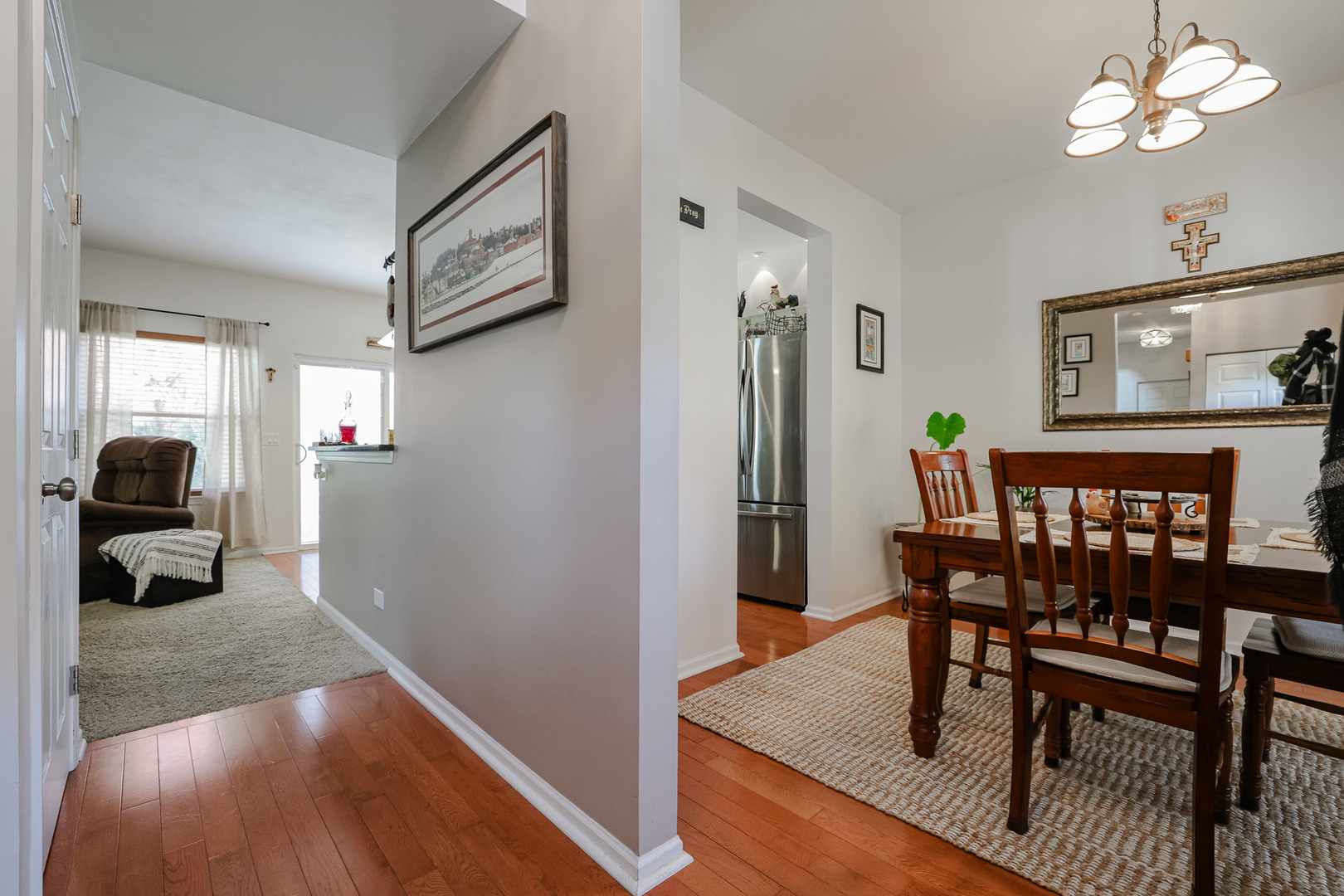 7 Michael Court Lake In The Hills, IL 60156 - Photo 3 of 37 a view of a dining room with furniture and wooden floor