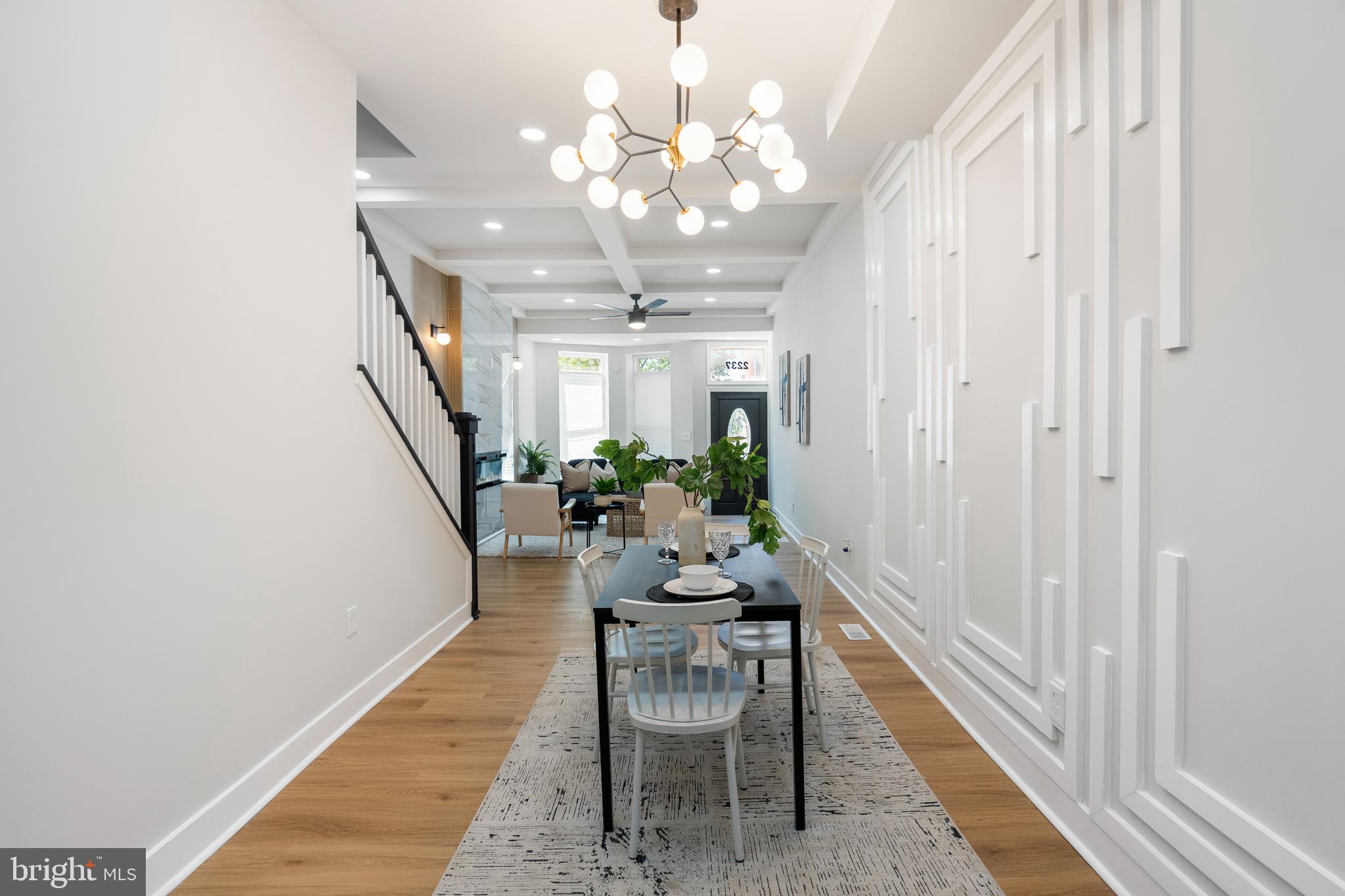 2237 Madison Avenue Baltimore, MD 21217 - Photo 11 of 53 a dining room with furniture and chandelier