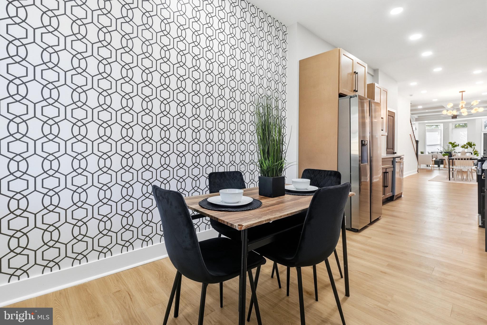 2237 Madison Avenue Baltimore, MD 21217 - Photo 17 of 53 a view of a dining room with furniture and wooden floor