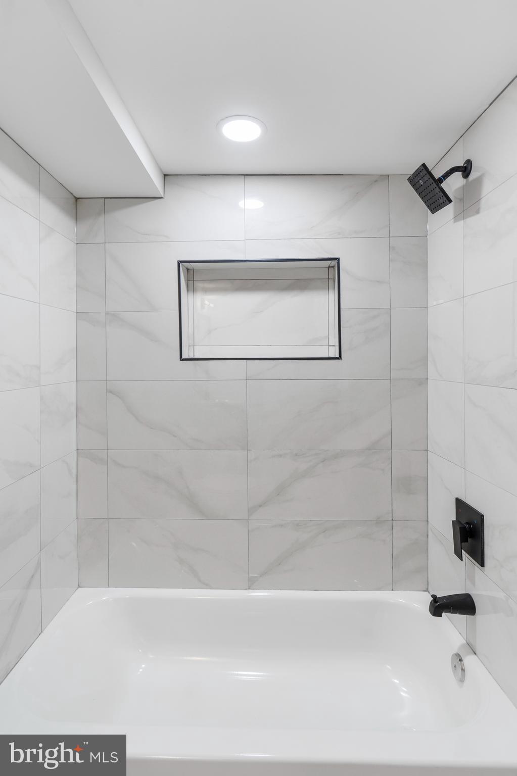 2237 Madison Avenue Baltimore, MD 21217 - Photo 31 of 53 a bathroom with a bathtub