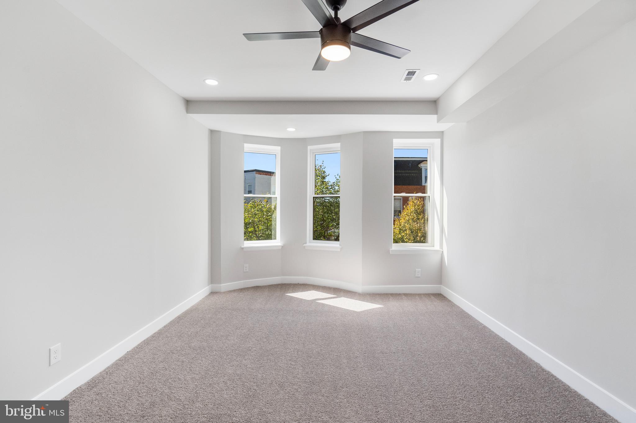 2237 Madison Avenue Baltimore, MD 21217 - Photo 45 of 53 an empty room with windows and entrance