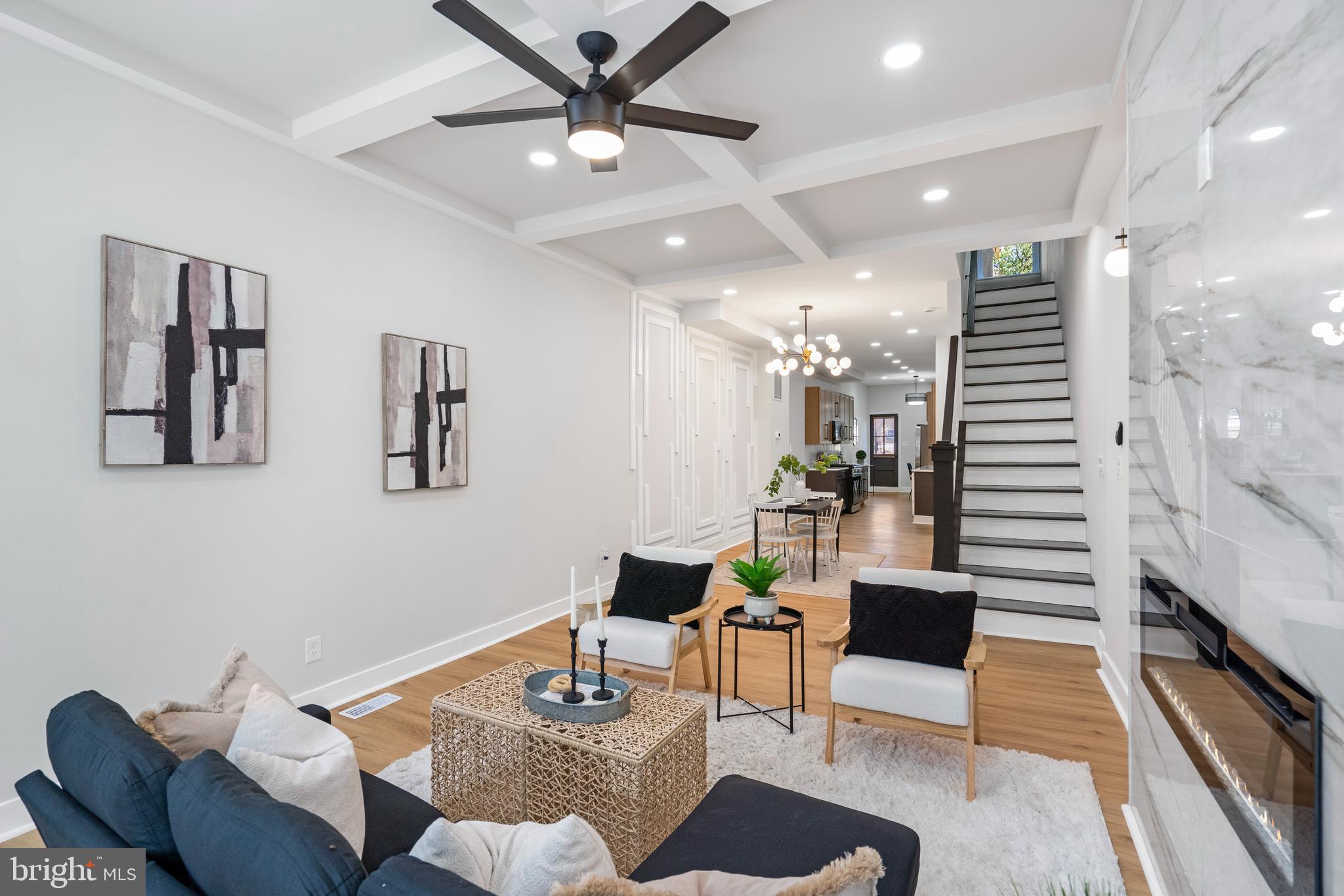 2237 Madison Avenue Baltimore, MD 21217 - Photo 6 of 53 a living room with furniture and a wooden floor