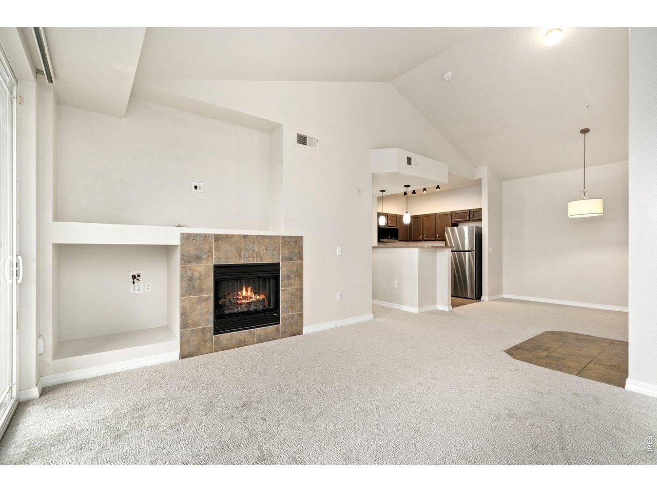 Immaculate condo with new paint, carpet and appliances!