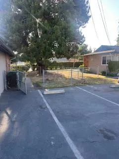 a view of a yard with patio