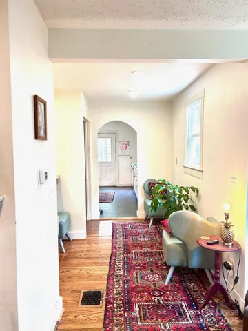 a living room with a couch and a table