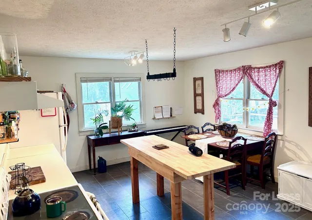 a very nice looking living room with furniture and a wooden floor
