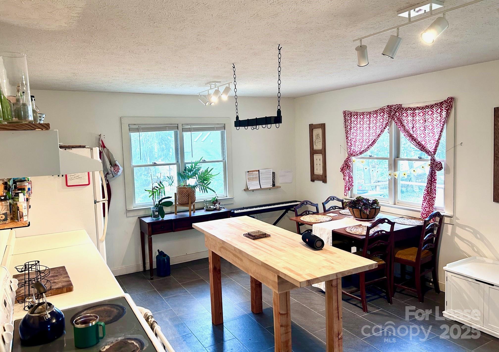15 Pruitt Street Asheville, NC 28806 - Photo 7 of 19 a very nice looking living room with furniture and a wooden floor