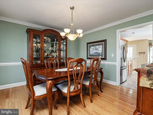 a view of an entryway door with a staircase