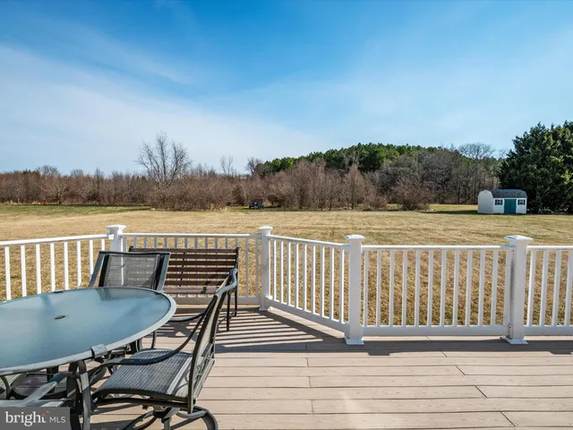 a view of a backyard of the house