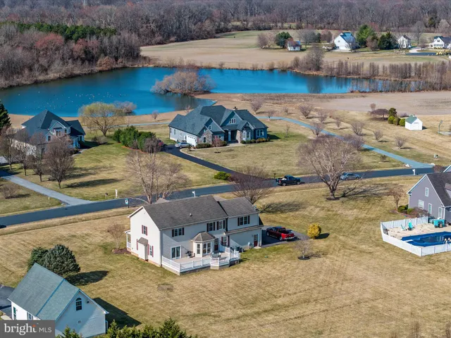 swimming pool view with a outdoor seating