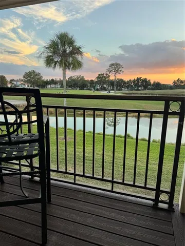 a view of balcony with furniture