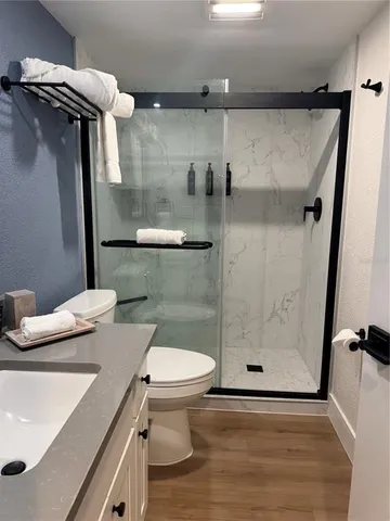 a bathroom with a sink and a shower
