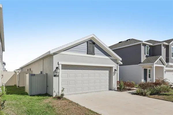 a view of a house with a garage