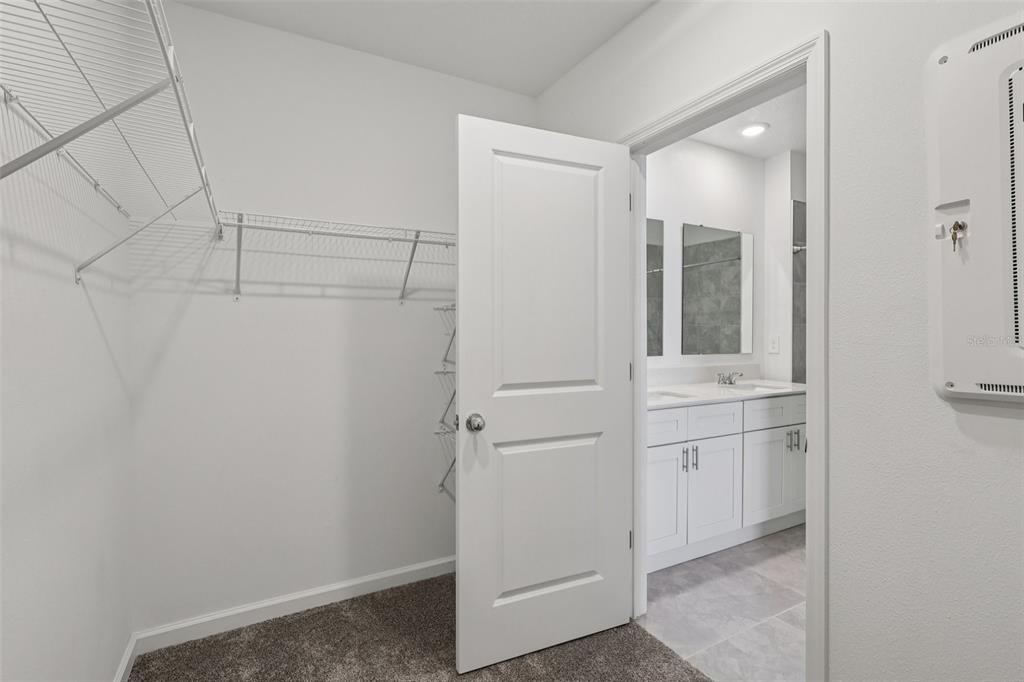 1723 Foreman Road Eagle Lake, FL 33839 - Photo 29 of 34 a bathroom with a shower and a sink